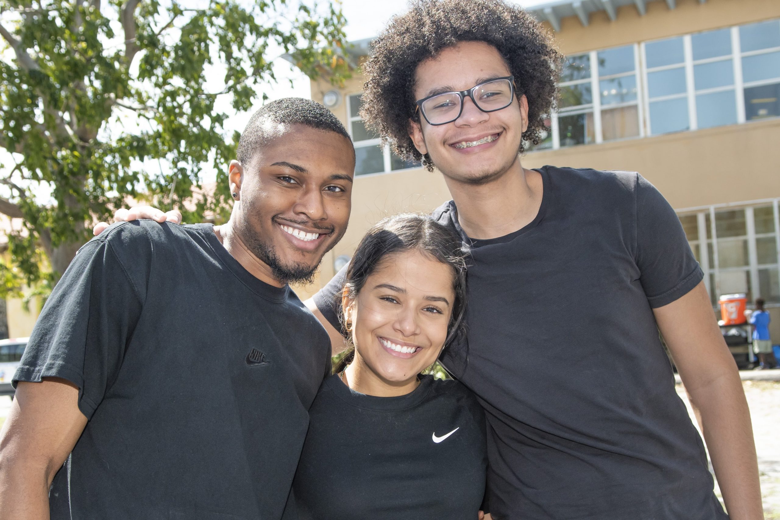 graduate student volunteers playing basketball